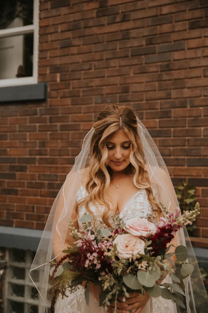 Detailed wedding hair styling, up close Detailed bridal hair styling by Artistry Lounge Bridal in Bay City